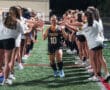 Field hockey player high-fives teammates on the field, wearing a Tigers jersey, surrounded by cheering team members.