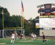 Field hockey game at Wright Field, players in action, scoreboard displaying 0-0, North Allegheny Tigers vs MTLebo.