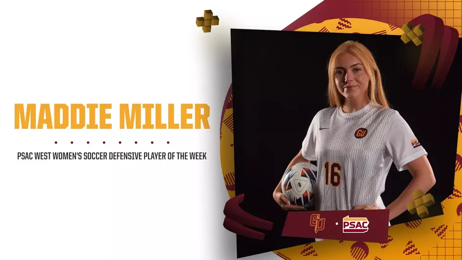 Soccer player in a white jersey holding a ball, recognized as PSAC West Women's Defensive Player of the Week.