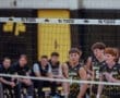 High school volleyball players from North Allegheny preparing for a match with team spirit and focus visible on their faces.