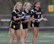 Story: Tigers pour it on in the rain; defeat North Catholic, 35-7