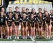 Cheerful team photo of the Tigers flag football squad, showcasing players in black uniforms at their home field.